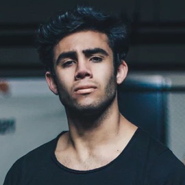 An employee's headshot photo looking into the camera